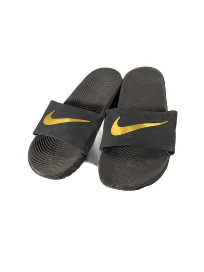 black Nike Kawa slide sandals