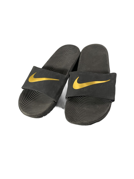 black Nike Kawa slide sandals