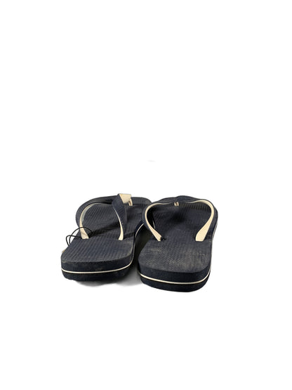 black rubber flip-flop sandals