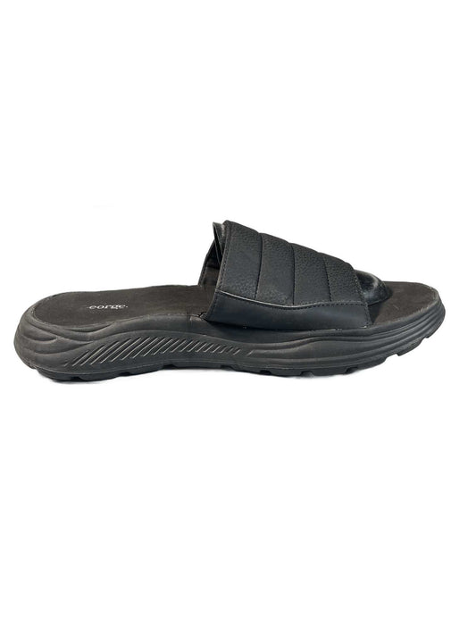 Black quilted slide sandal with a curved comfort sole
