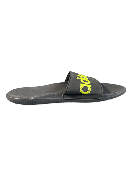Black and neon-yellow Adidas recovery/shower slide