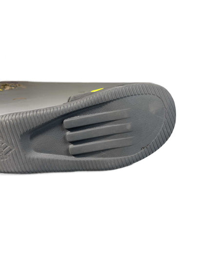 Black and neon-yellow Adidas recovery/shower slide