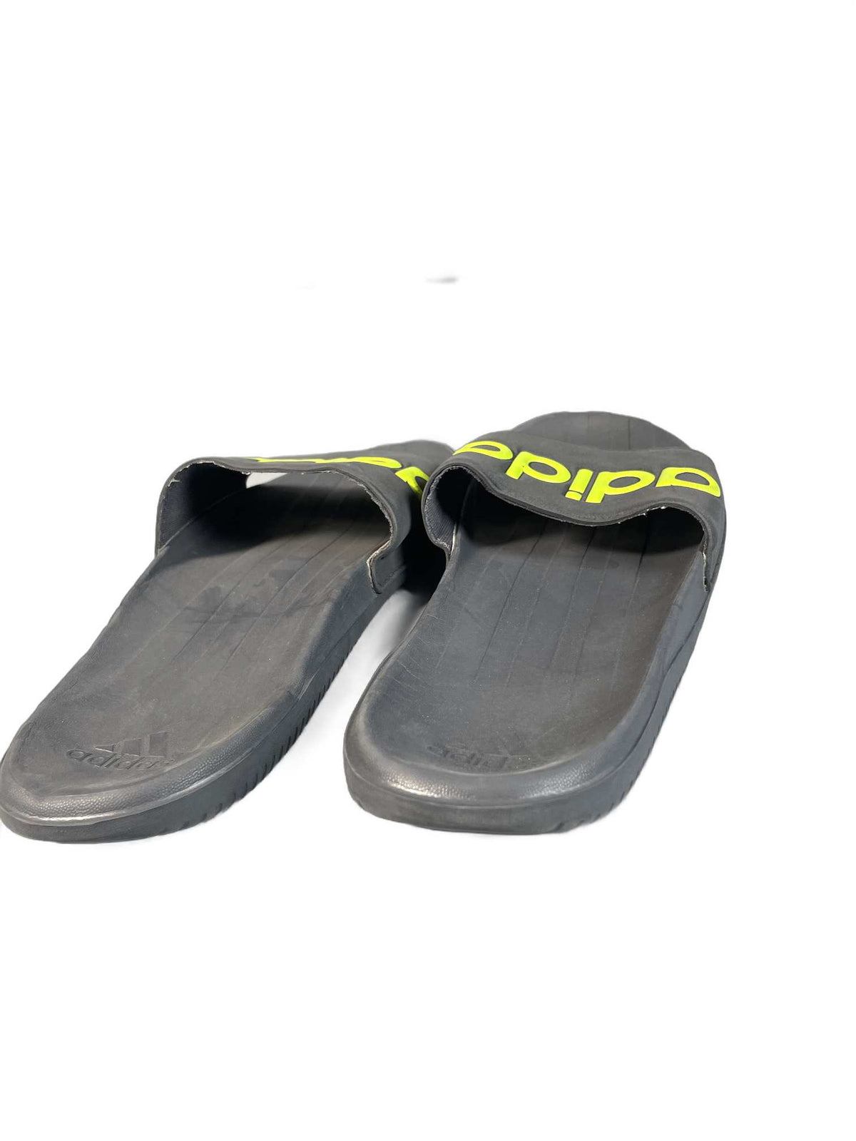 Black and neon-yellow Adidas recovery/shower slide
