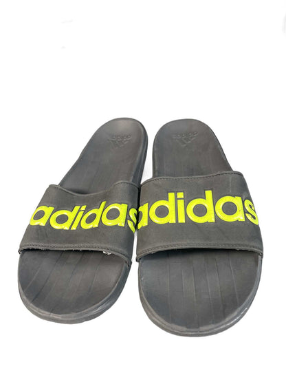 Black and neon-yellow Adidas recovery/shower slide