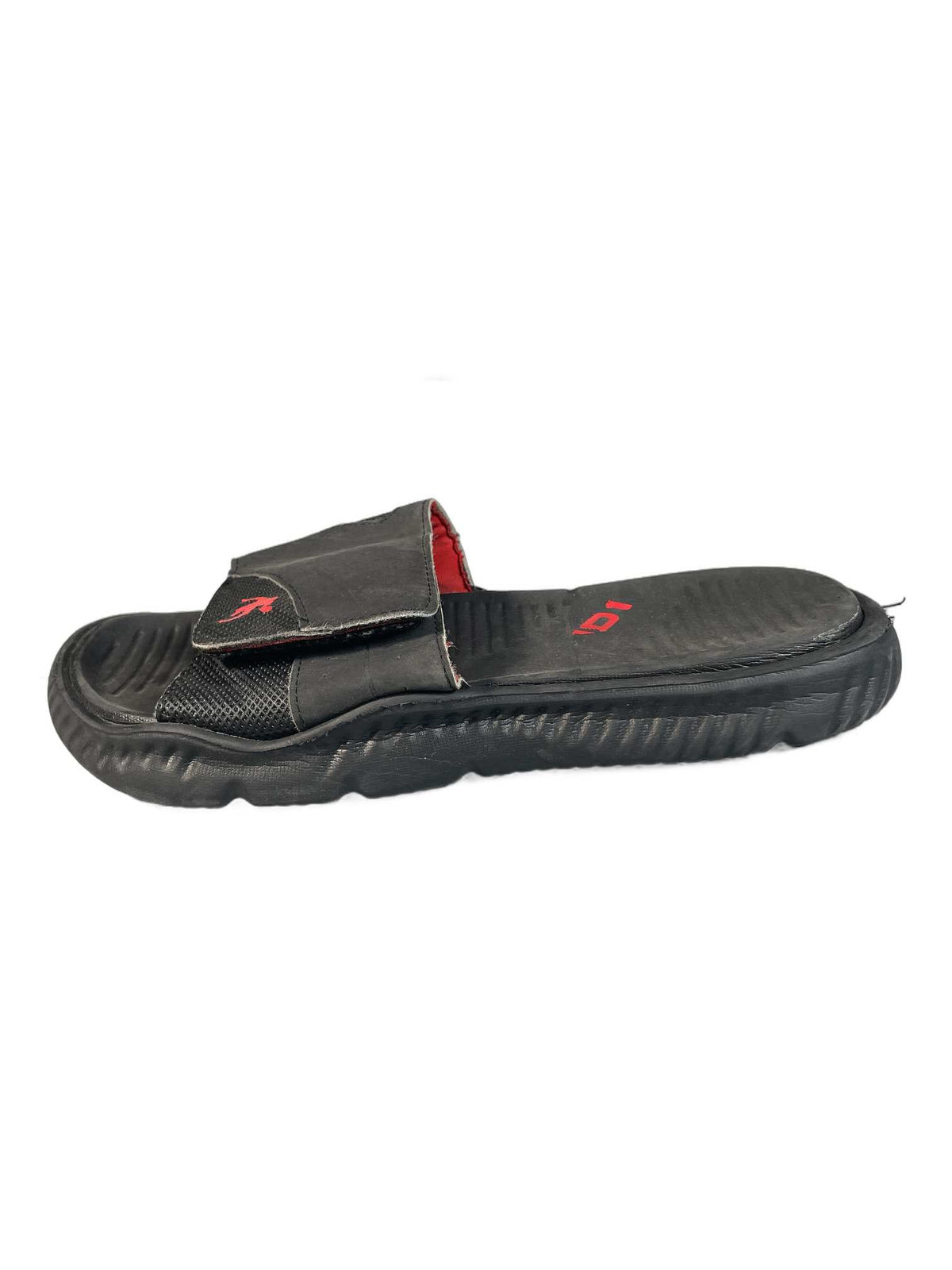 Black athletic slide sandal with a ribbed EVA foam