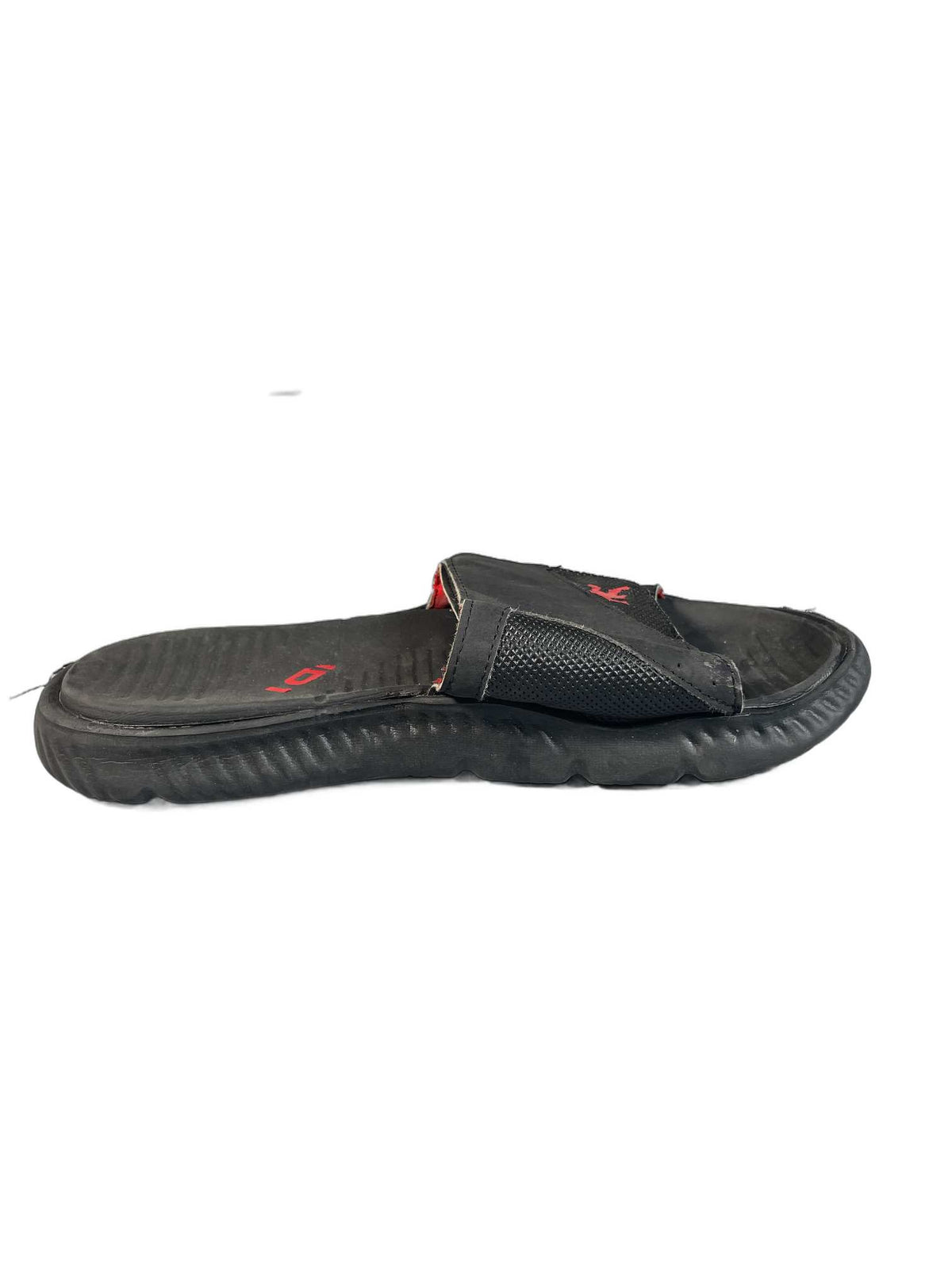 Black athletic slide sandal with a ribbed EVA foam