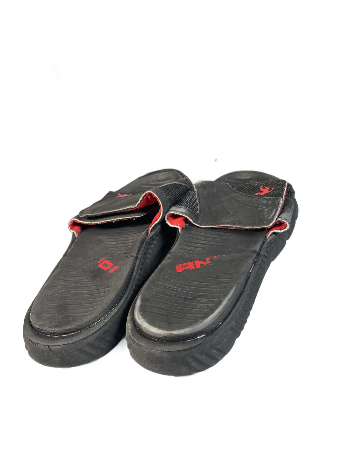 Black athletic slide sandal with a ribbed EVA foam