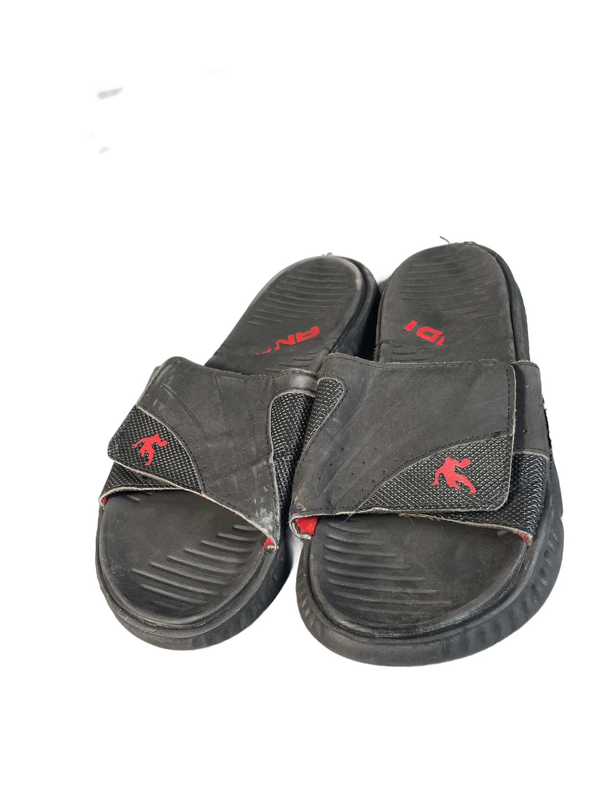 Black athletic slide sandal with a ribbed EVA foam