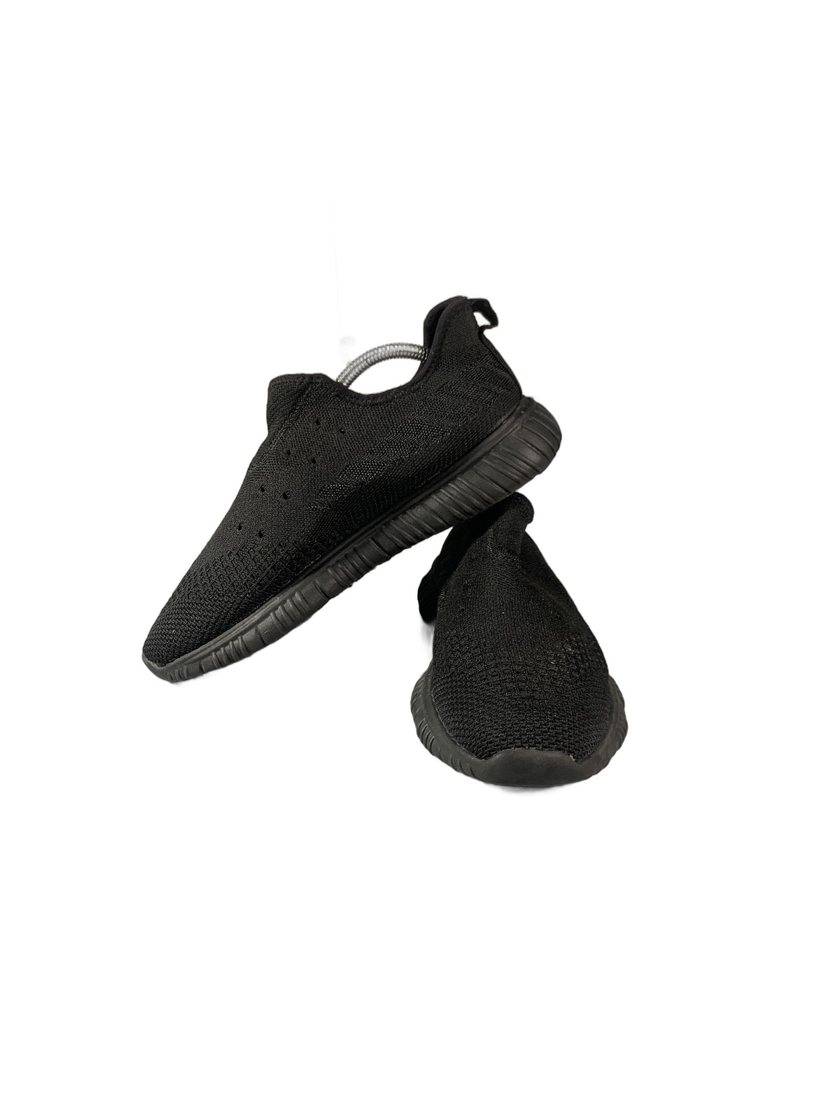 black slip-on knit sneaker with a grooved rubber sole shoe