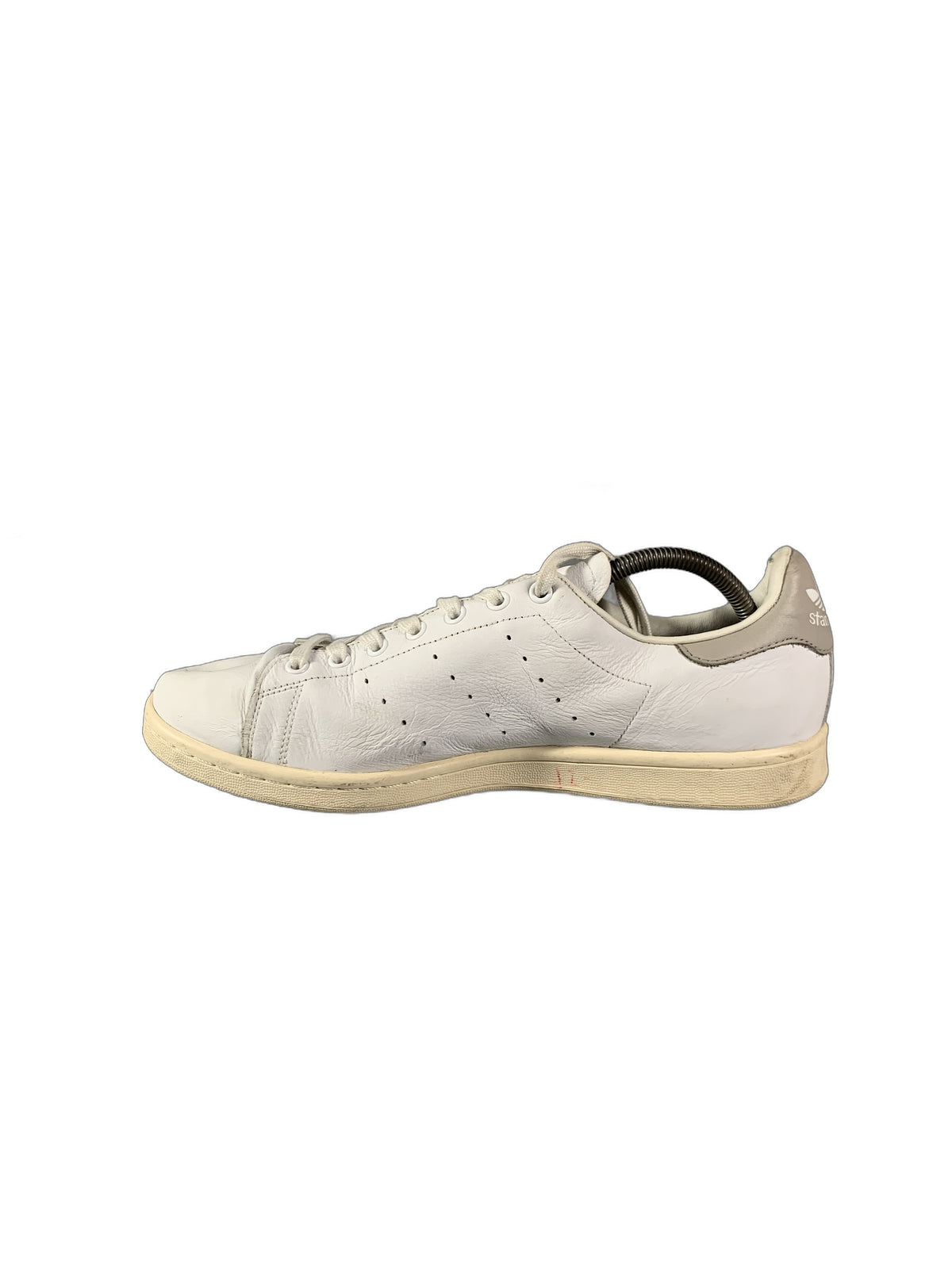 Adidas Stan Smith sneaker features a clean white leather