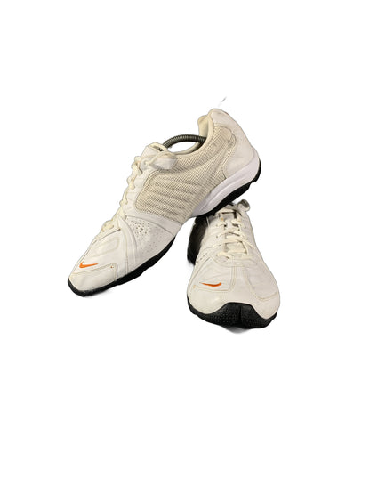 Nike athletic shoe in a white and orange
