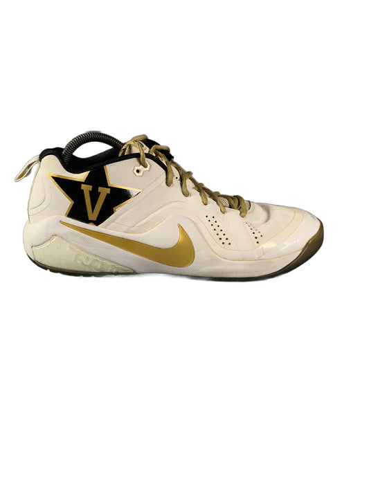 Nike  white and gold athletic shoe