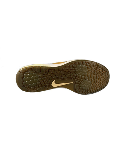 Nike  white and gold athletic shoe