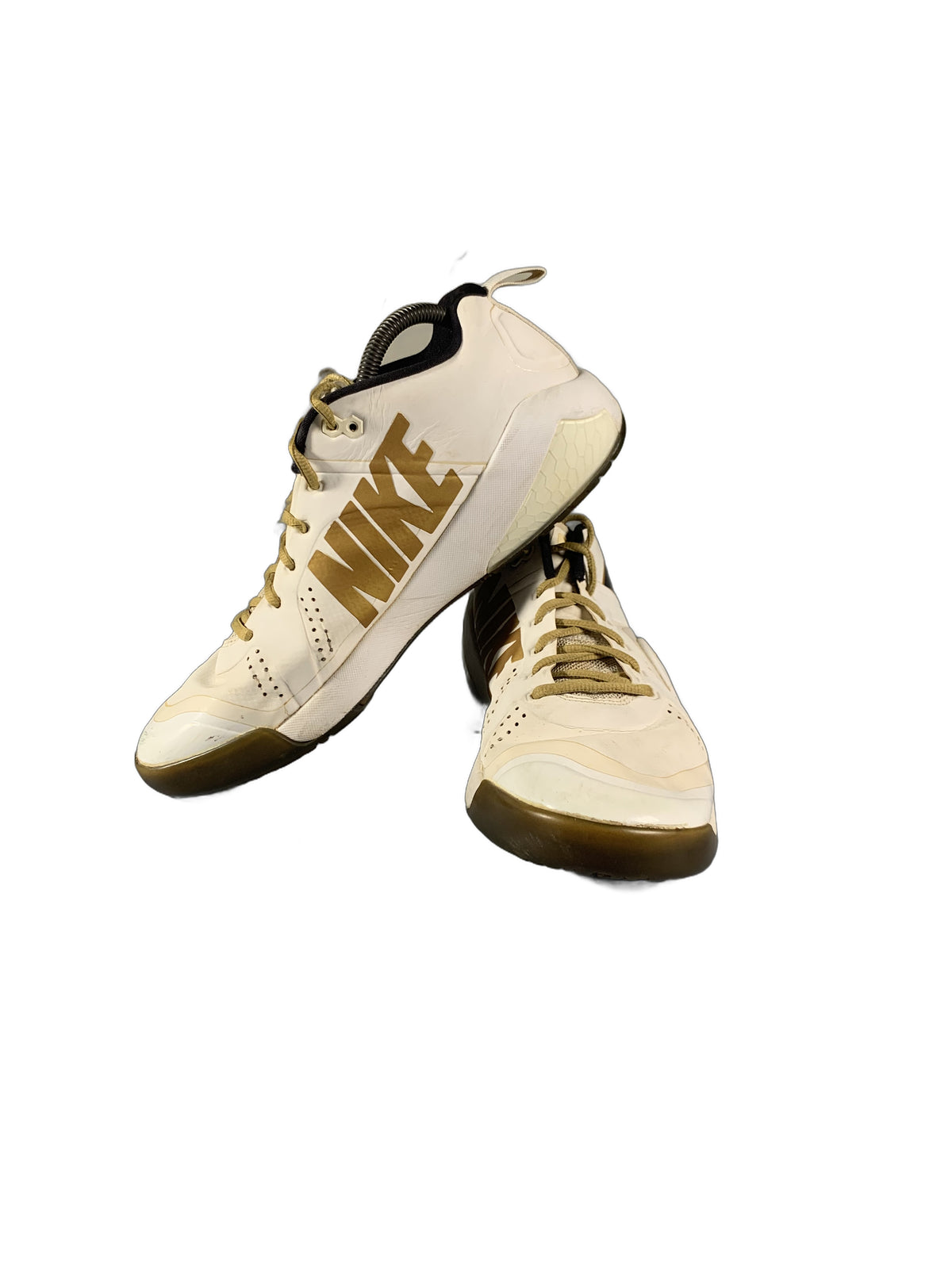 Nike  white and gold athletic shoe